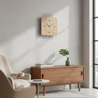 Standuhren.com 🕰️ AMS W9692 Wanduhr mit modernem Metall-Design und hellem Sonoma-Holz-Zifferblatt in einem Wohnzimmer