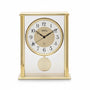 Standuhren.com 🕰️ AMS F5191 Funk-Tischuhr mit goldenem Metallgehäuse, Mineralglas und Pendel in modernem Design