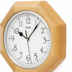 Standuhren.com 🕰️ AMS Funkwanduhr mit achteckigem Gehäuse aus hellem Buchen-Massivholz und weißem Zifferblatt
